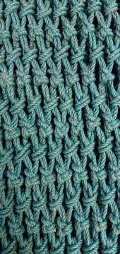 A lump of crocheted plastic rope Stock-Fotos