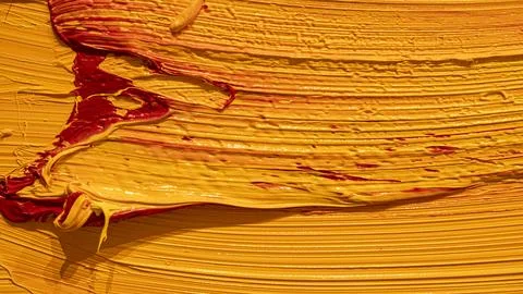 Lumpy texture of a yellow paint colour Stock Photos