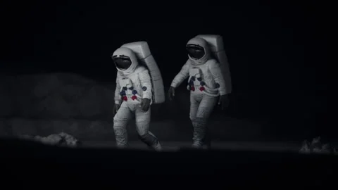 Lunar astronauts walking on the moon's surface Vidéo 282037762