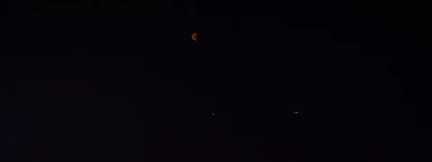 Lunar eclipse city panorama Stock Footage 92999480