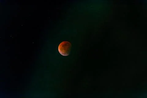 Lunar eclipse on clear night Stock Photos