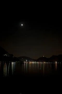Lunar Eclipse over Lake Como in Italy Stock Photos