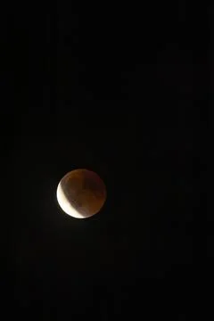 Lunar eclipse phase showing red blood moon Stock Photos