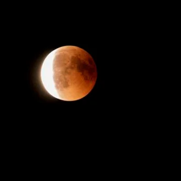 Lunar eclipse. Red Moon. Timelapse Stock Photos
