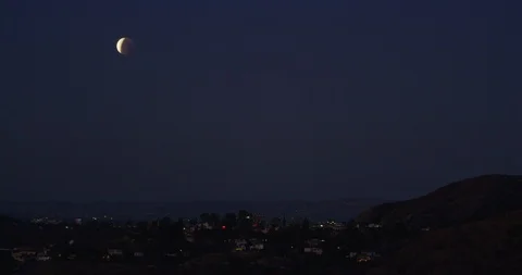 Lunar Eclipse as seen in Los Angeles, California Stock Footage 99158964