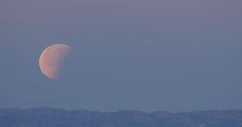 Lunar Eclipse as seen in Los Angeles, California Stock Footage 99159253