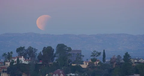 Lunar Eclipse as seen in Los Angeles, California Stock Footage 99159291