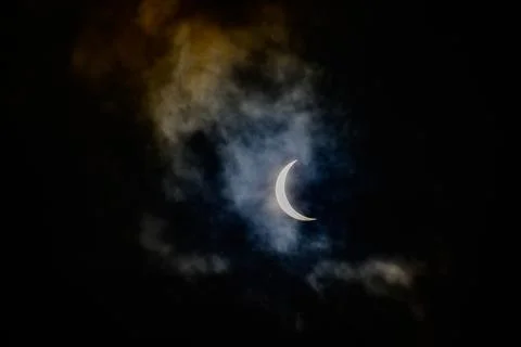 Lunar Eclipse through the clouds Foto stock