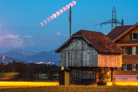 Lunar eclipse trail scenery in rural place lucerne Stock Photos