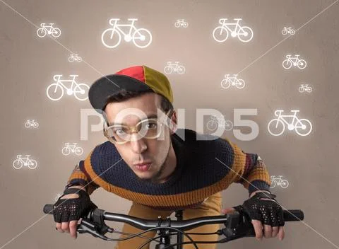 Lunatic cyclist with bike on the background Stock Photos