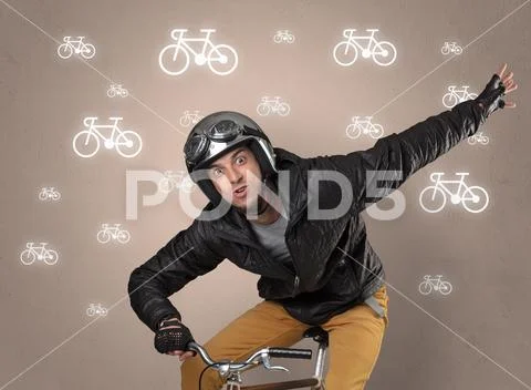 Lunatic cyclist with bike on the background Stock Photos