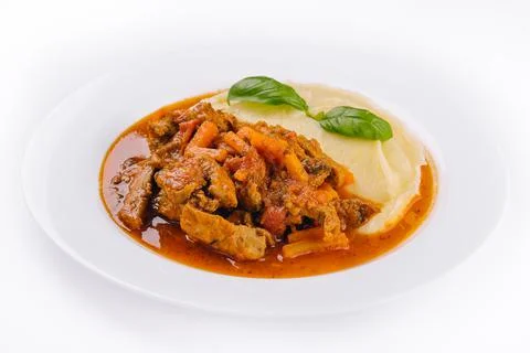 Lunch with beef bourguignon stew served with mashed potatoes on a plate Stock Photos