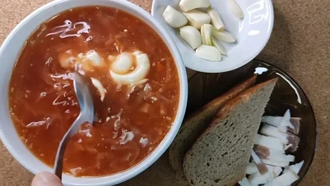 Lunch: borscht with mayonnaise, sliced bread and lard Stock Footage 182800609
