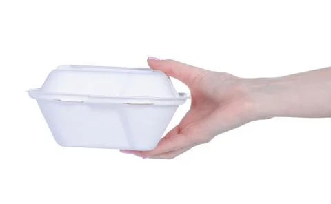Lunch box in hand Stock Photos