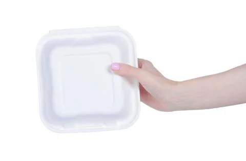 Lunch box in hand Stock Photos