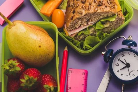 Lunch boxes with fresh breakfast. Breakfast school time concept. Stock Photos
