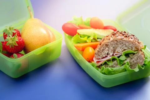 Lunch boxes with fresh healthy second breakfast. Stock Photos