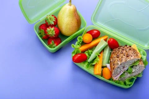 Lunch boxes with fresh healthy second breakfast. Stock Photos