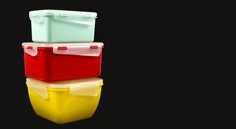Lunch boxes made of eco plastic for easy storage of food in the kitchen. Isol Stock Photos