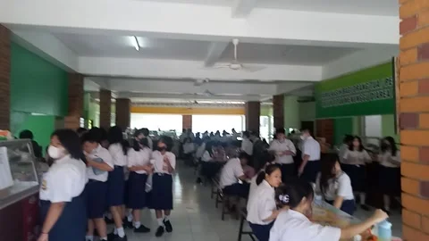 Lunch break in the canteen junior high school student Stock Footage 217357527