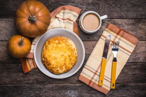 Lunch coffee with flatbread and pumpkins on wooden table Stock Photos