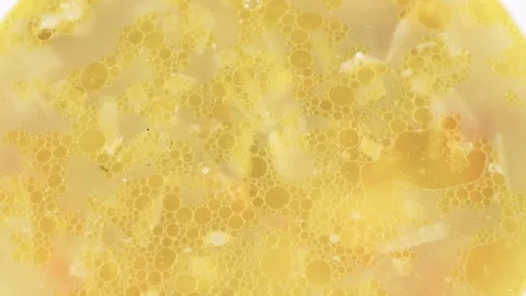 Lunch from the first dish, hot nutritious soup closeup Stock Footage 106846269