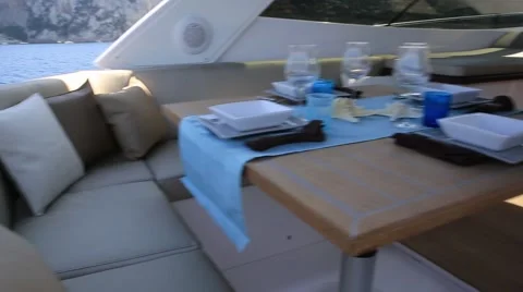 Lunch on motor yacht, Table setting at a luxury yacht. Stock Footage 63265184