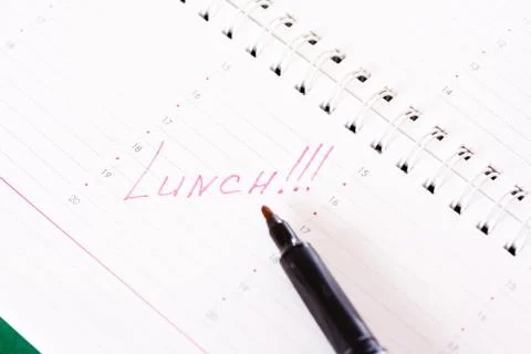 Lunch reminding note in calendar. Stock Photos