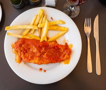 Lunch at restaurant - marinated fish cooked with seafood Stock Photos