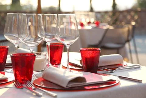 Lunch table set up with red glasses 02 Stock Photos