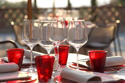 Lunch table set up with red glasses 01 Stock Photos