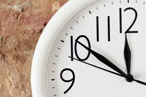 Lunch time concept. A part of clock face Stock Photos