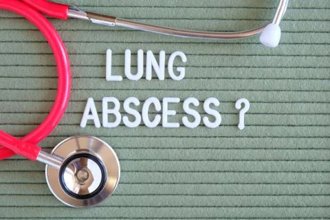 Lung abscess- text with a question mark on  green background with  stethoscop Фото