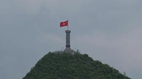 Lung Cu Flagpole under clear blue sky Stock Footage 310096910