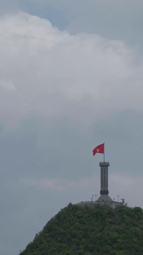 Lung Cu Flagpole under clear blue sky Stock Footage 310097122