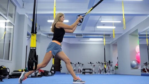 Lunges exercise in gym Stock Footage 105345067