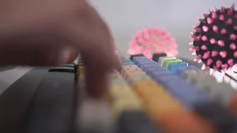 Lurking coronaviruses on the surface of the keyboard Stock Footage 126912638