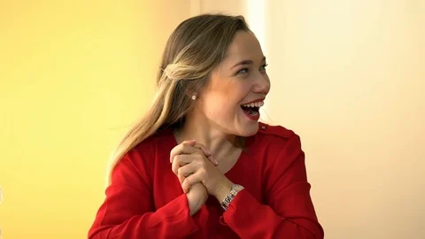 Luscious blonde in a red jacket performs office work, an office girl with big Stock Footage 100371879