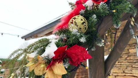 A lush and fragrant cascade of fresh evergreen boughs generously spills Stock Footage 335726508