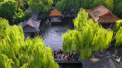 Lush Baotu Spring Scenic Area: traditional Chinese gardens  in Jinan Stock Footage 331117367