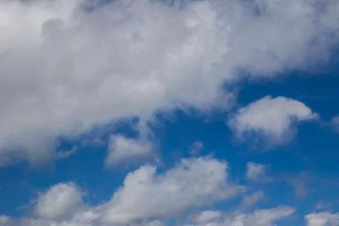 Lush clouds in the sky in the spring Stock Photos