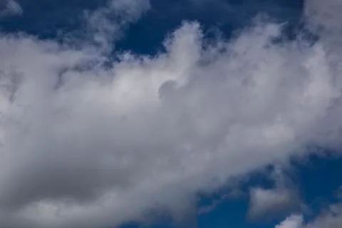 Lush clouds in the sky in the spring Stock Photos