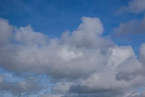 Lush clouds in the sky in the spring Stock Photos