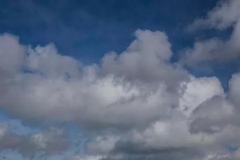Lush clouds in the sky in the spring Stock Photos