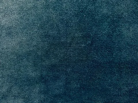 Lush deep blue carpet texture macro reveals plush fibrous softness in tranqui Stock Photos