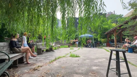 Lush foliage thrive inside La Plaza Cultural de Armando Perez in East Village Stock-Footage 344906719