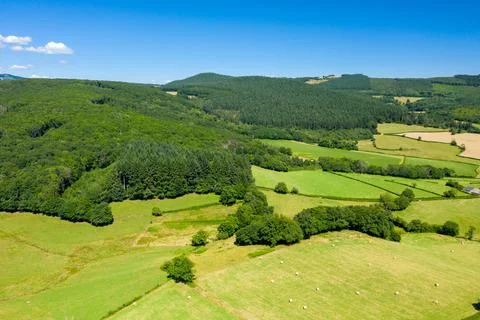 Lush forested hills and patchwork fields Morvan 스톡 사진