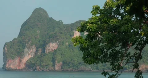 Lush green coastal rocks of Phi Phi DOn in Thailand Video stock 297353267
