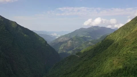 Lush Green Himalayan Mountain Slopes and Village Nepal Aerial View Stock Footage 337535939