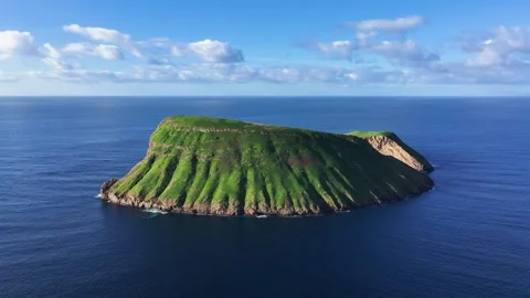 Lush green slopes of Cabras Islets near Terceira coastline, Azores 動画素材 328958033
